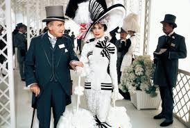 Audrey Hepburn's most famous look from My Fair Lady is not her triumph at the gala but at the disastrous first outing at the race track. This had to be 60's inspired, right?